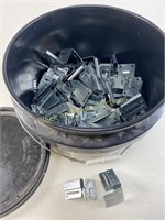 Almost full bucket of ceiling clips