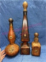 (3) Italian Leather decanters w/ wood stoppers