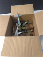 Box of toy airplanes