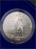 1986 Silver Dollar, Ellis Island Uncirculated OGP