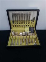 Mixed set of silver serving ware in the case