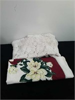 58x100 in crocheted tablecloth and a 60x78-in