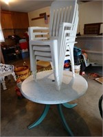 Patio table w/4 plastic chairs
