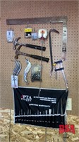 Tools on Wall to Incl. Square, Claw Hammers, Tape