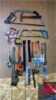 Tools on Wall to Incl. Small Swede Saw, Hack Saw