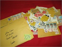 Envelope full of different stamps Good cond