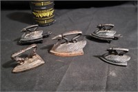 Five miniature figural swan sad irons