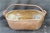 Antique copper basket with metal handle,