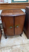 Antique music cabinet with contents measures 27