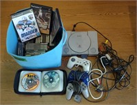 PlayStation 2 w/ Remotes, Cords, & Games