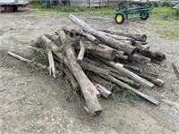 Stack Of Miscellaneous Wooden Posts