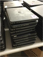 Stack of 10 HP laptops