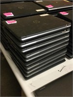 Stack of 10 HP laptops