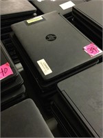 Stack of 10 HP laptops