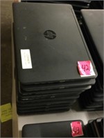 Stack of 10 HP laptops