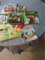 Large group of Disney books and other items