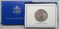 1986 UNC Liberty Half Dollar with Box and COA.