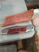 Folding knife with leather sheath 17 and 1/2 in