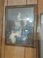 Ornate framed photograph of wedding couple