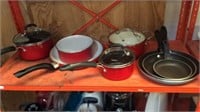 Shelf of skillets and pans