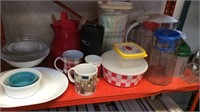 Shelf of cups, bowls, containers and pitchers