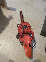 Orange Black & Decker electric hedge trimmer