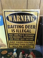 Warning baiting deer is illegal metal sign