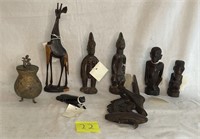 Grouping of (7) Carved African Figurines and Cover