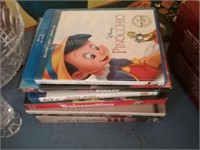 Group of movies including Disney Pinocchio girl