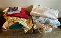 2 boxes of linens and blankets
