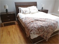 1 Queen bed and two night stands. Includes