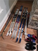 4 pair Cross Country Skis, 2 pr poles, 2 pr boots