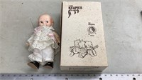 Kewpie doll with box