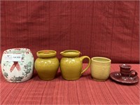 Five unmatched by the pottery items