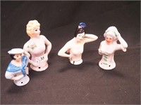 Four vintage half-dolls from 2 3/4" to 3 3/4"