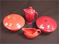 Four pieces of Fiestaware: two 9 1/2" covered