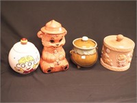 Four cookie jars: Smokey The Bear, cauldron,