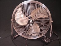 A Haier metal floor fan, 18" diameter