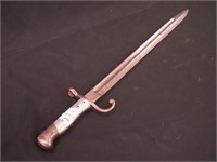 Vintage bayonet with striated metal hilt