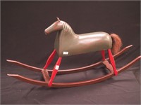 Contemporary country primitive rocking horse,