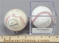 Lou Brock & Phil Nickro Signed Baseballs