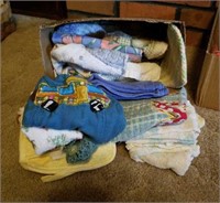 Lot of dishrags and pot holders