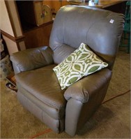 Lane Tan leather recliner with decorative pillow