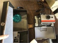 Polaroid land camera, case, and accessories