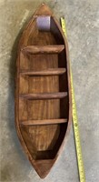 Wooden canoe wall shelf