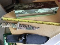 Survivor knife with sheath and box