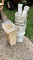 Downspout extensions, plastic buckets