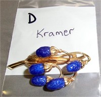 D-  Kramer costume brooch w/Lapis type stones