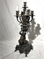 Bronze ornate candle holder.@ 24x8.