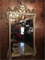 Large composite framed mirror 32x57.